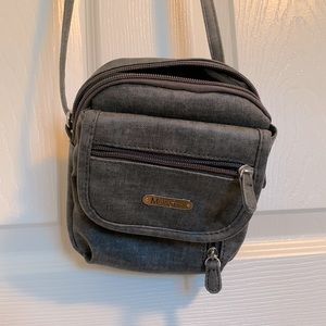 Small gray travel purse with adjustable strap